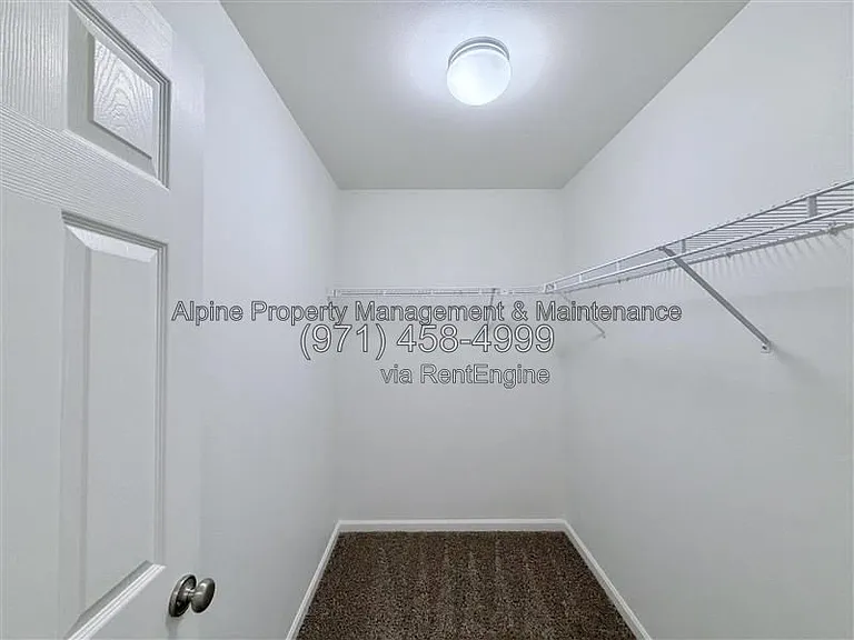 5758 NE Damsel Dr — Photo 31