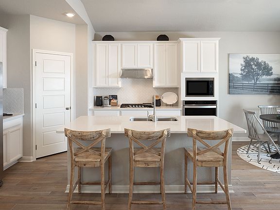 Cook delicious family meals in the gourmet kitchen.