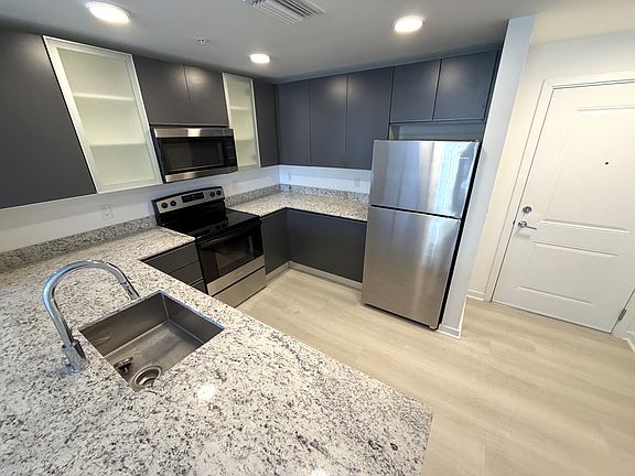 2nd image of 5587 Millenia Blvd #104-104CLAIMSHOA
