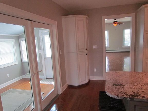 Kitchen view to living room and breakfast nook.