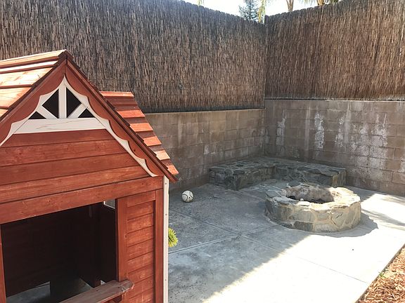 fire pit and playhouse