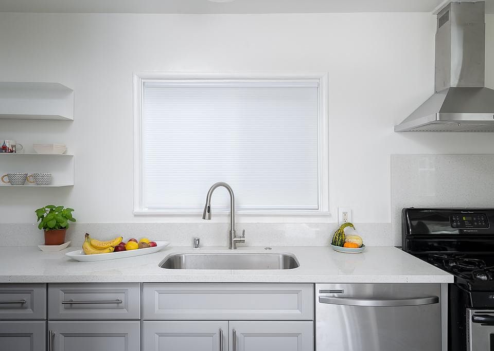 All new cabinet with extra large kitchen sink and stainless steel appliances. And new dish washer