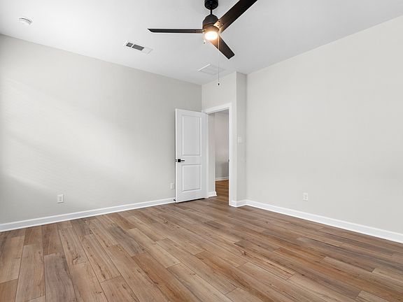 This master bedroom can fit anything you and your spouse need.