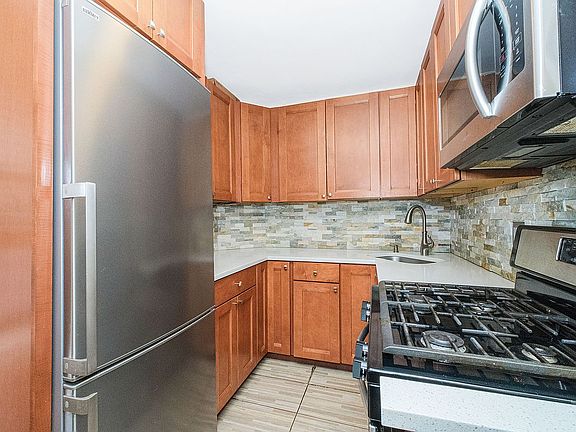 2nd image of 9265 Shore Rd #4E