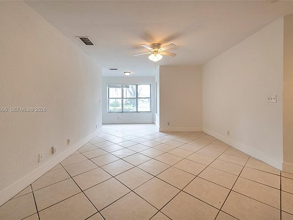 4th image of 3480 Pinewalk Dr N APT 116