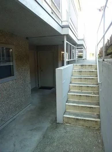 Steps down to unit