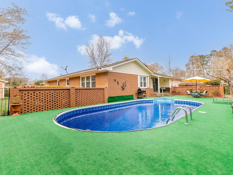 Outdoor Pool area w/Salt water pool & spacious hangout spots
