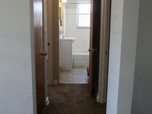Looking down the hallway toward the bedrooms and bathroom