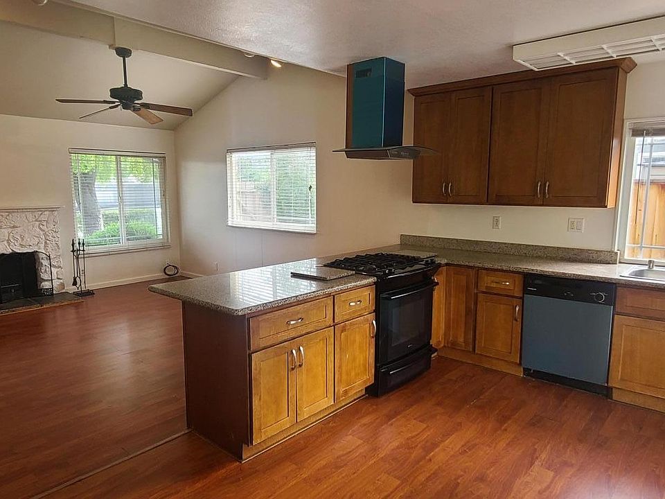 This is the best area of the house after remodeling it . the kitchen dinning area and family room are now open for family days or entertain .