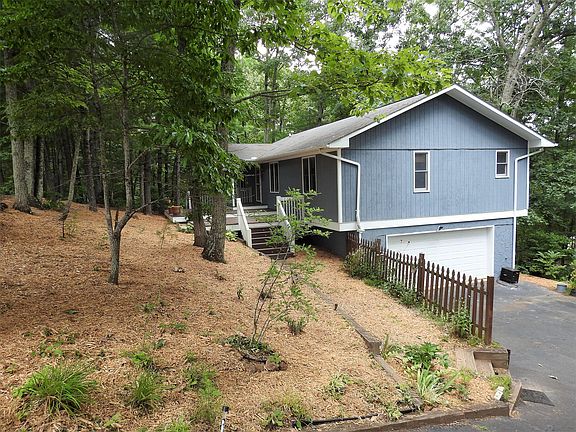 Side of house and two car garage