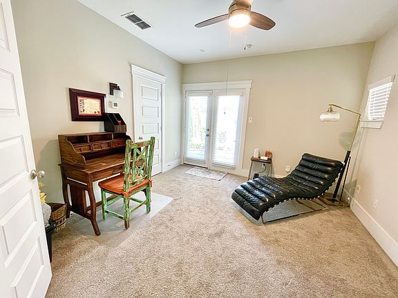 Bedroom/Study on first floor with full bathroom and access to the backyard.
