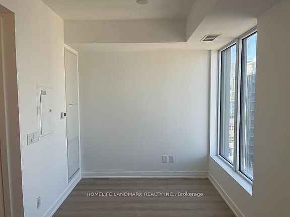 2nd image of 100 Queen St E #3211