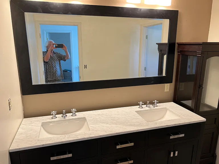 Modern double sink and vanit mirro in upstairs bathroom