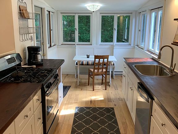 Eat-in kitchen with access to deck.