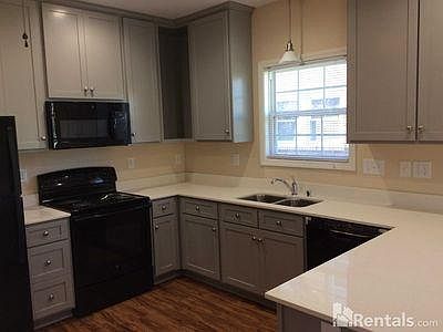 Kitchen is open to main living area.