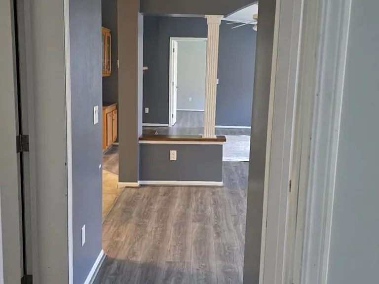 View down hallway from 2nd bedroom