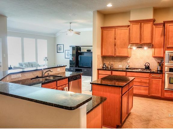 Kitchen looking into informal living room