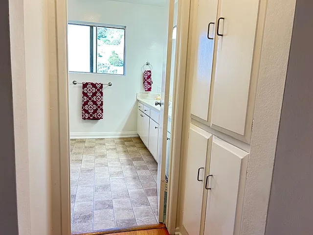 Main floor bathroom with extra storage space.