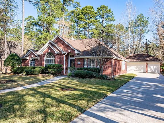 lovely landscaping and leading you to your 3-car garage
