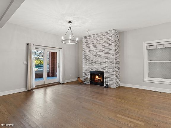 Enter into 1,600 sqft of modern living. Enjoy a wood burning fireplace with a gas starter from a living room that leads to your private front terrace.