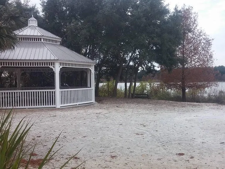 Enjoy a pleasant walk around the peaceful lake within the community.
