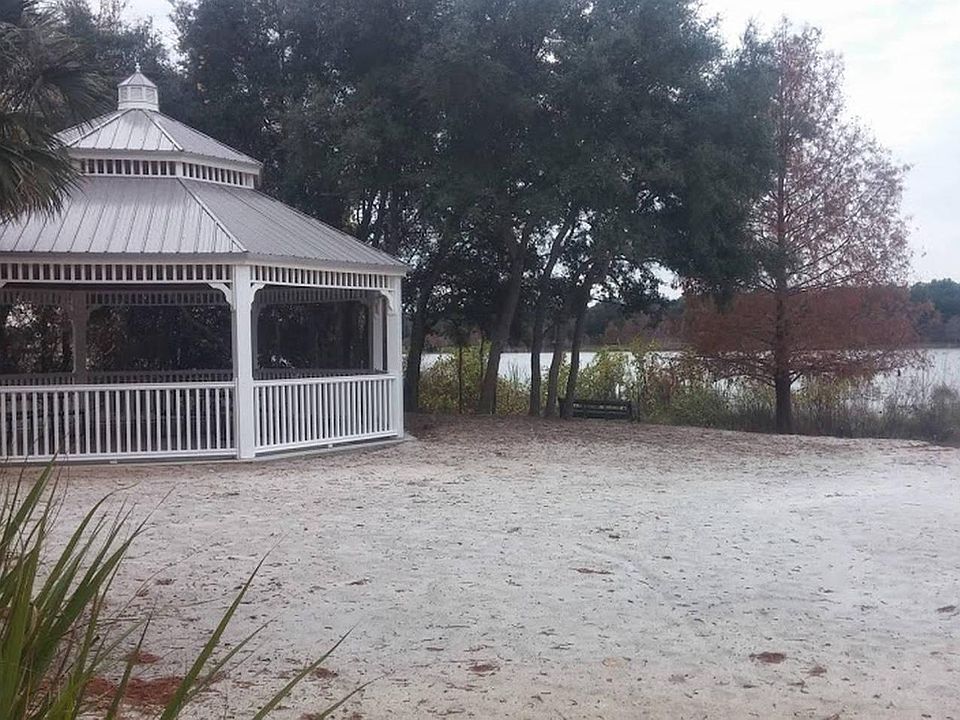 Enjoy a pleasant walk around the peaceful lake within the community.