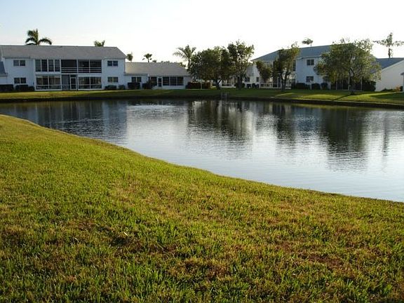One of two lakes in the quiet community close to golfing, beaches and FL sun..
