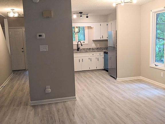 Open concept living, dining and kitchen