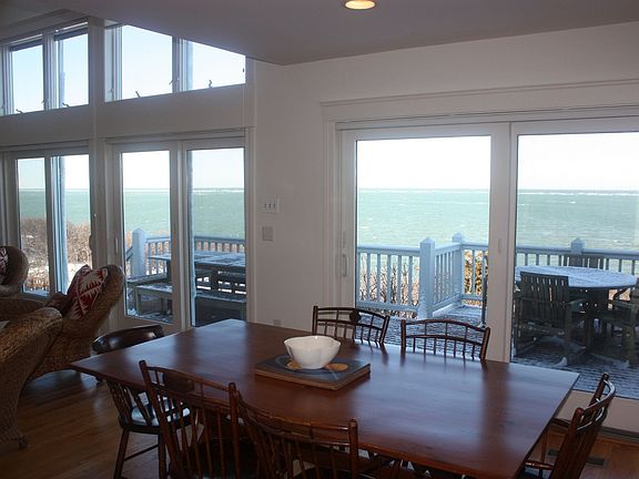 Dining room with sliders to deck