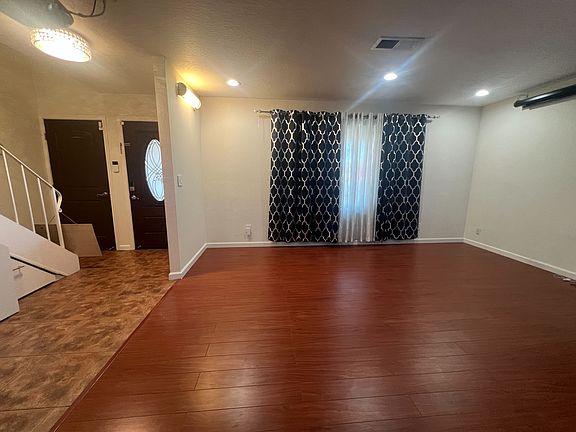 Main entrance and garage door
Living room and stairway