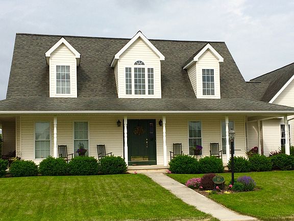 Cape with wrap-around porch