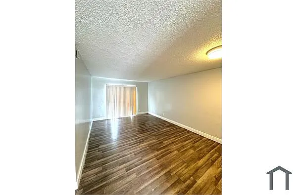 Building Photo - 3375 Avenue J #12