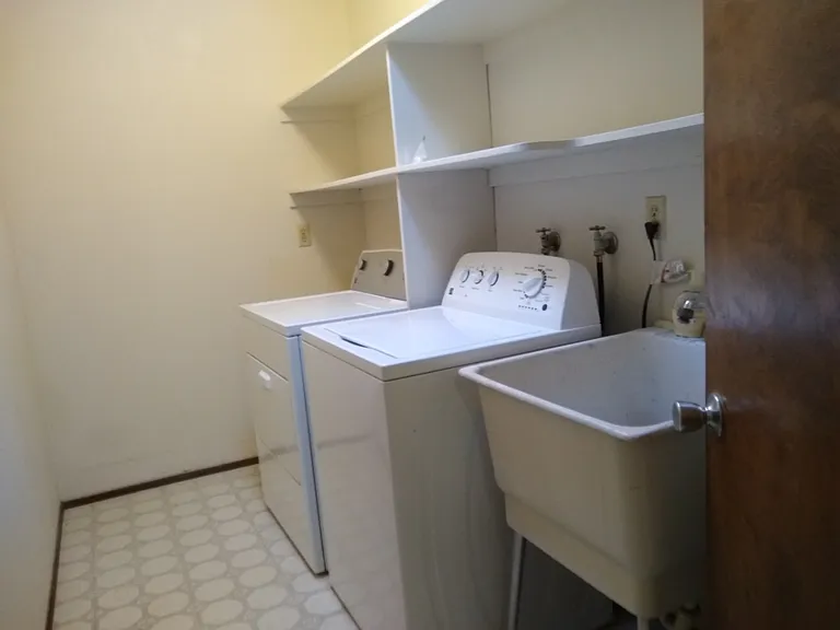 Laundry room with deep utility sink.