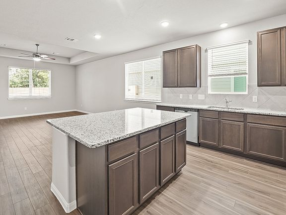 Kitchen to Dining Area and Family Room