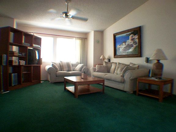 Bright airy living area with vaulted ceilings!