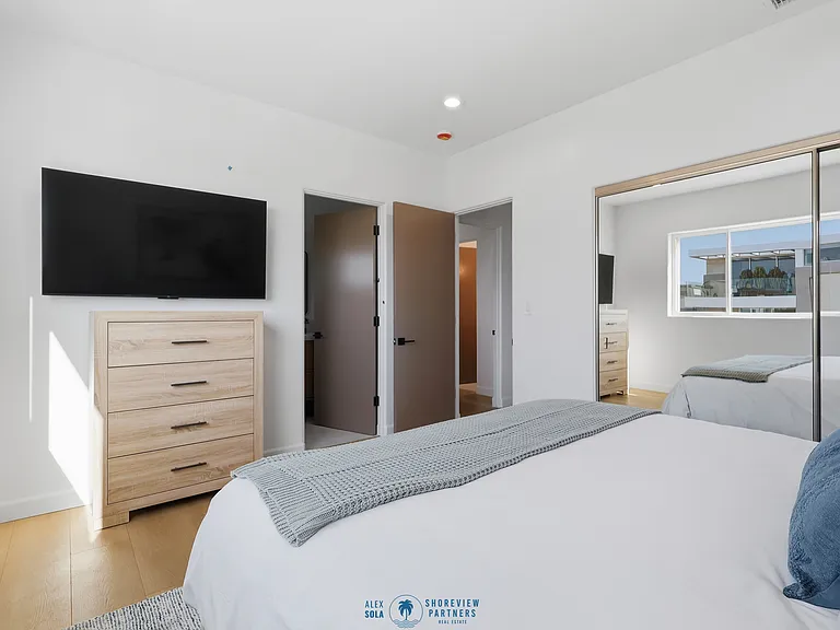 Bedroom 2 features full bathroom, large closet, and stunning ocean views.