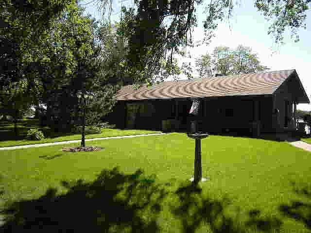 Cedar Siding Updated Shingles on House and Garage