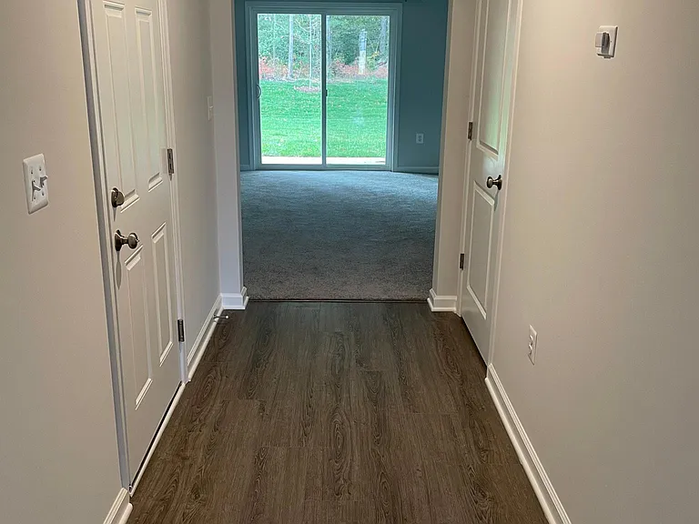 Recreation Room Entrance with half-bath -1st Floor