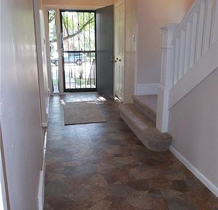 The 18' X 5' entryway has a large coat closet just inside the front door.