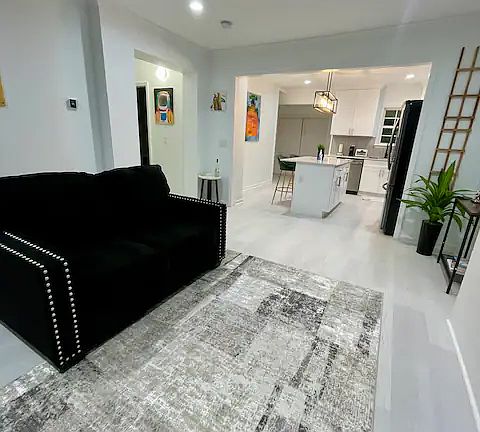 upstairs living room. Furniture not included but for sale