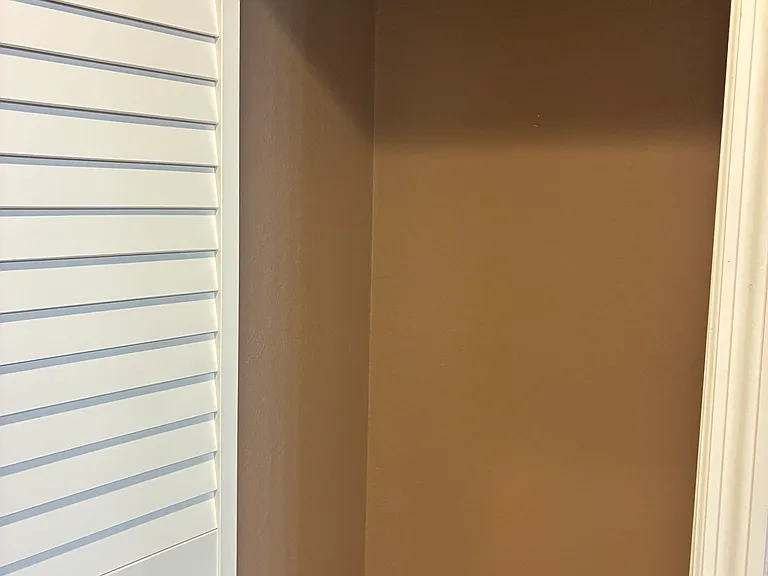 one of two primary closets