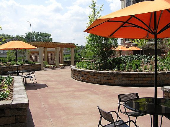 Walk-out condo onto a private plaza area.