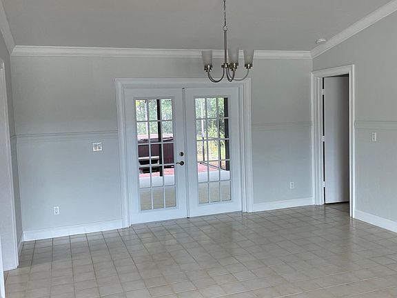 Dining room with new brushed nickel light fixture