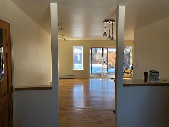 Large living area with sunset views.