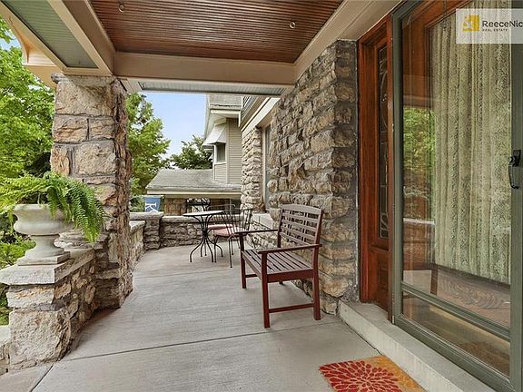 Lounge on the large stone front porch