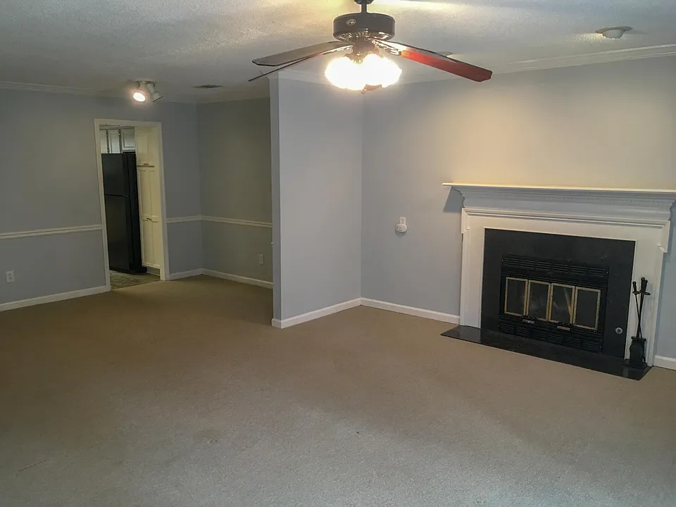 working fireplace and adjacent dining room