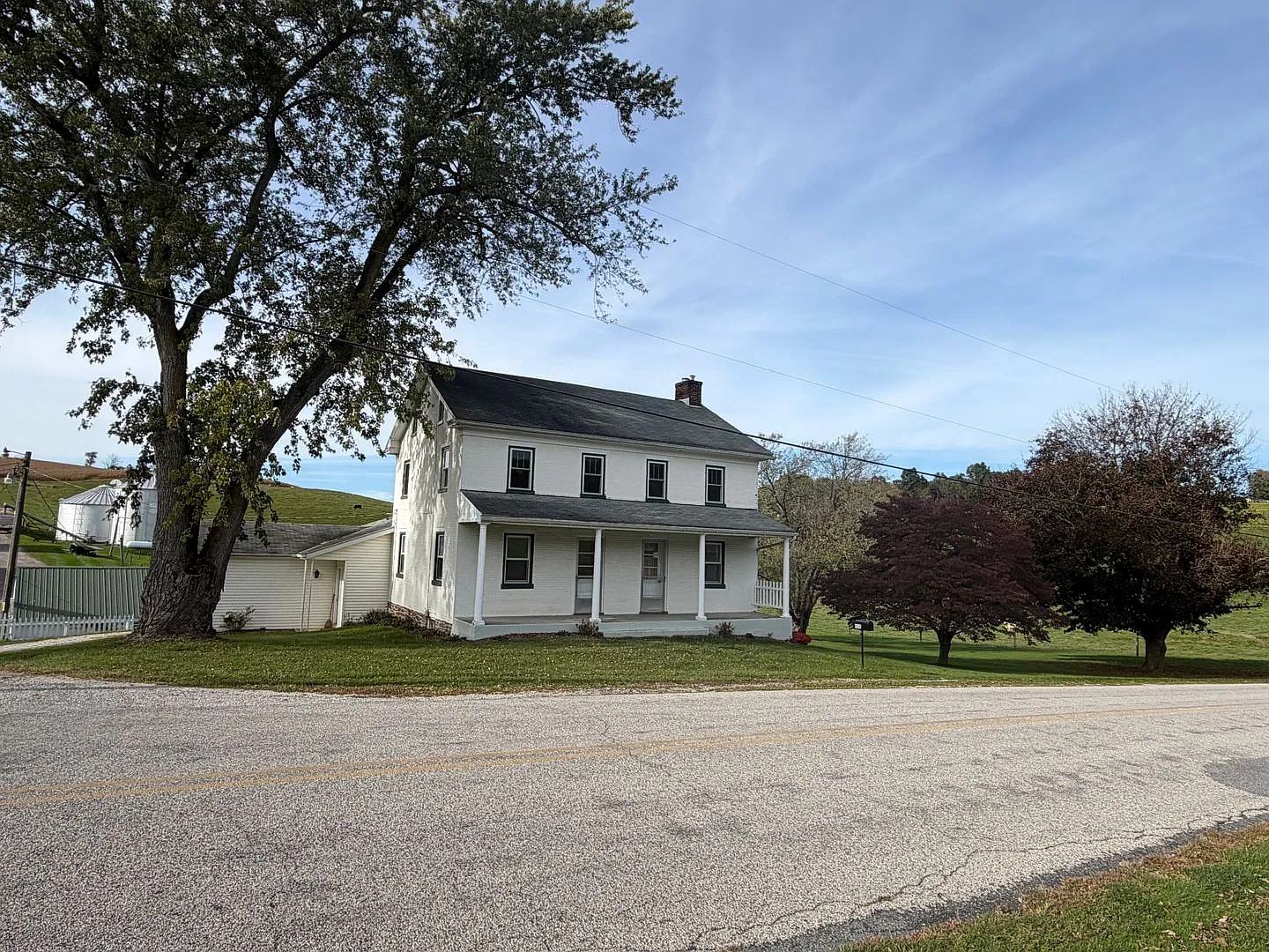 404 W. Springfield Rd. Farmhouse 4 Bedrooms | 2 Bathrooms | 3,468 Sq. Ft. — Photo 1