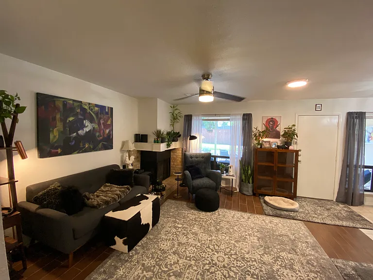Charming Living/Dining Room with working fireplace