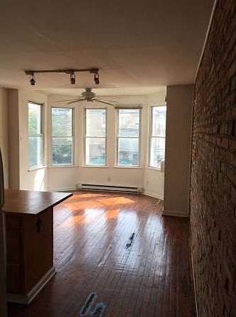 open living area w/ hardwood floors