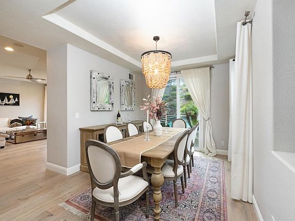 The dining room looks out onto the resort-like backyard
